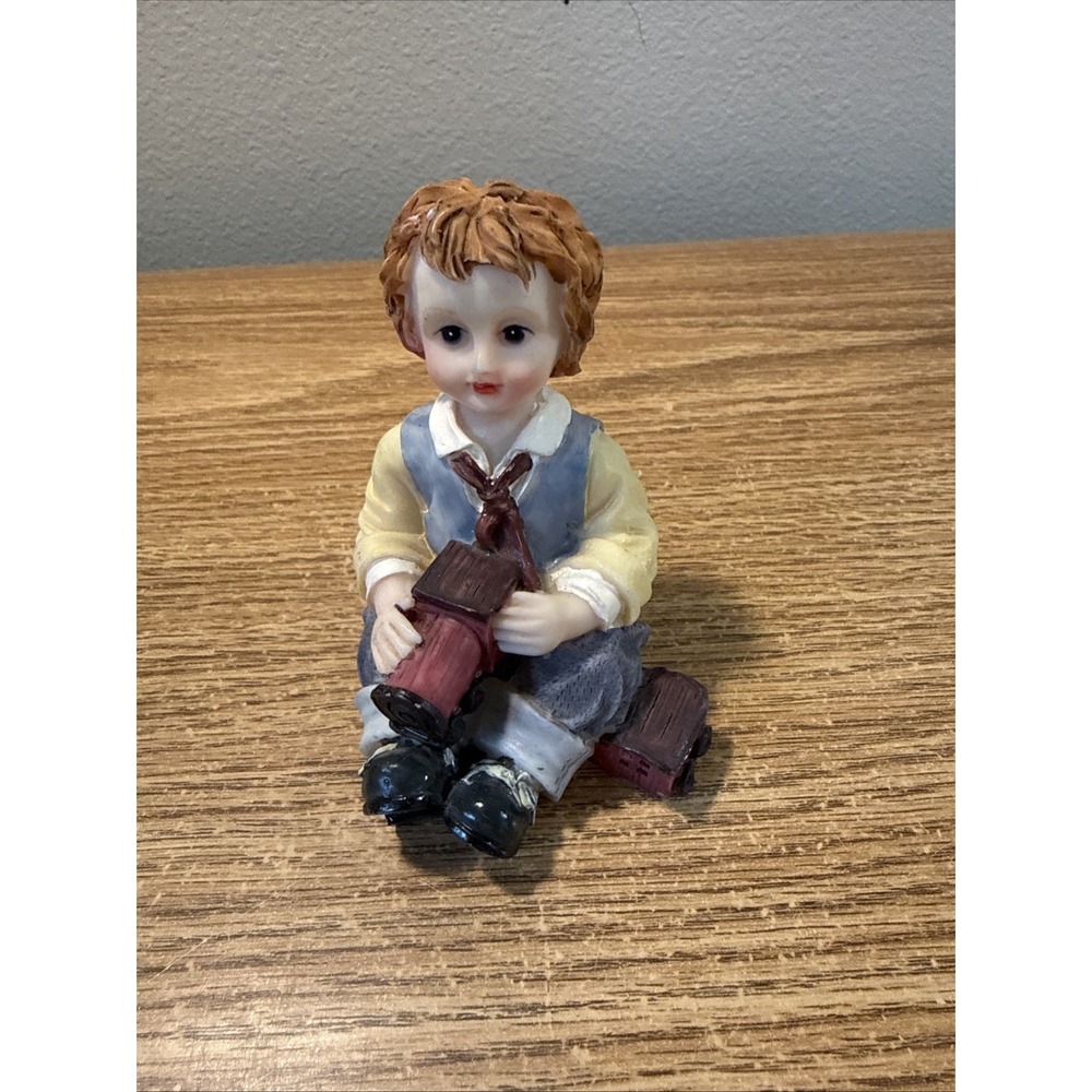 Boy Figurine‎ Holding A Train